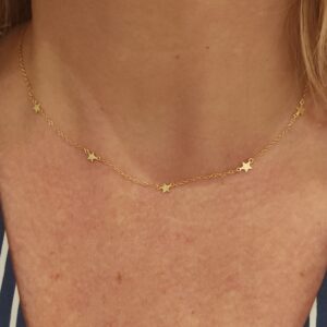 collar tiny star gold fondo blanco